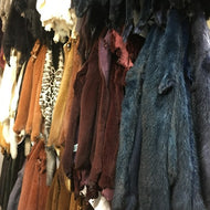 Assorted mink pelts and hides from Vilniaus Kailiai, showcasing luxurious mink skins for fur garments.