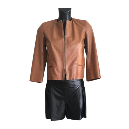Short brown leather jacket , zipping closure, small hidden pockets in front
