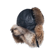 A black trapper style cap made of leather with raccoon fur trim, featuring an adjustable design and a soft lining.