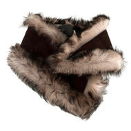 A brown and white sheepskin fur scarf with a fastening button, displayed in a fluffed-out state.