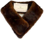 Mink scarf with lining and fur hook fastening wearable in several ways.